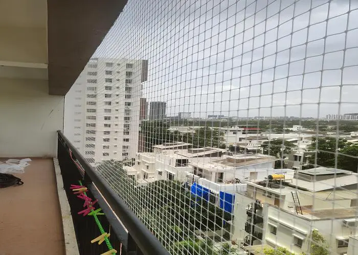 Ensuring Safety and Hygiene in Saras Baug Pune - Expert Pigeon Net & Invisible Grill Installations for a Protected Home